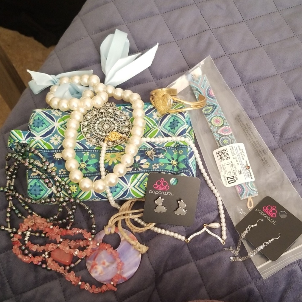 Brand new makeup bag filled with jewelry